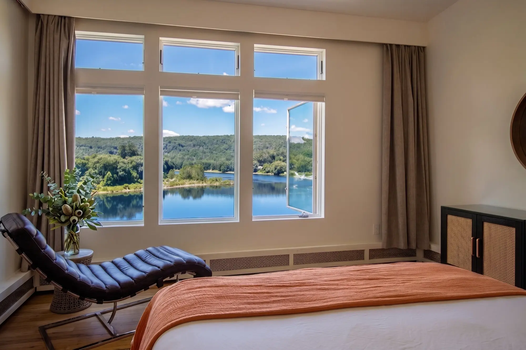 River Penthouse bedroom with chaise lounge and Delaware River view, Narrowsburg NY