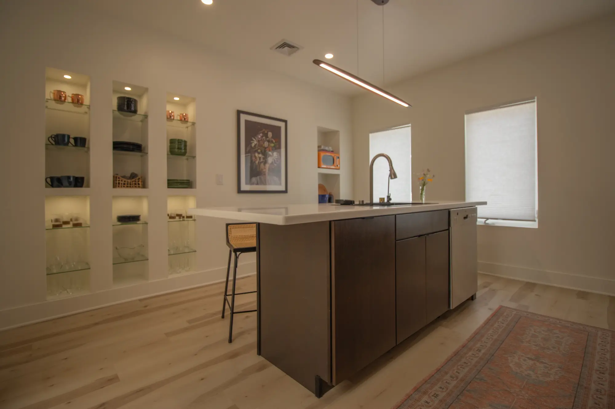 River Penthouse kitchen island with built-in glass display shelves, Narrowsburg NY